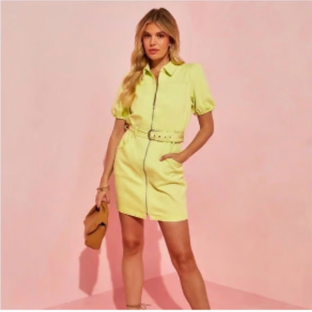 Skies Are Blue puff sleeve denim mini dress in a lime yellow-green color.
